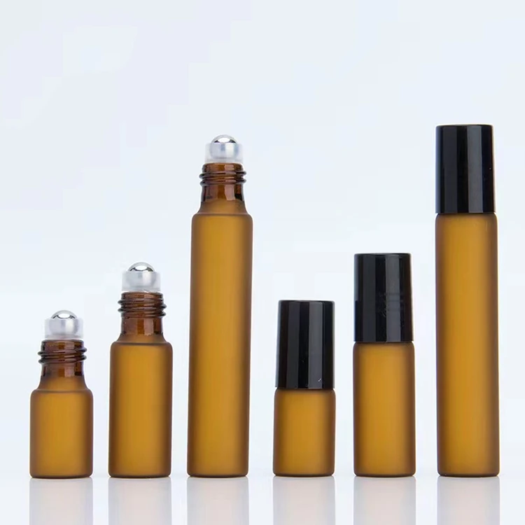 OEM ODM chinese wind 3ml 5ml 10ml essential oil frosted amber white glass ball bottles roller ball lip tube glass roll-on bottle