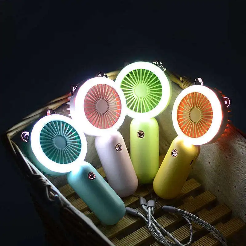 In stock Summer Small Pocket Cartoon Mini Fan Portable handheld Fan Cartoon Silent Night Light Mini Led Fan For Outdoor