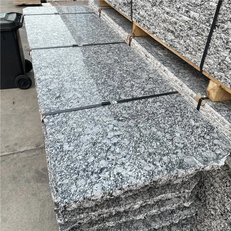 Professional China Modern Polished Sea Wave White Granite Marble 1-Year Warranty for Floor Usage Graphic Design Solution