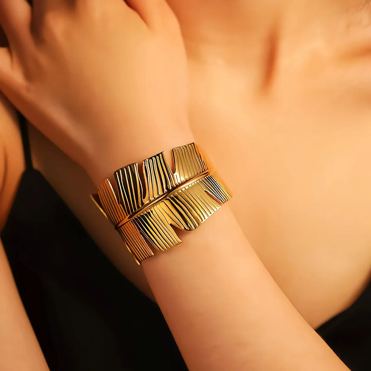 12pcs Interesting fashion design exaggerated large feather shaped stainless steel bracelet for women as a gift