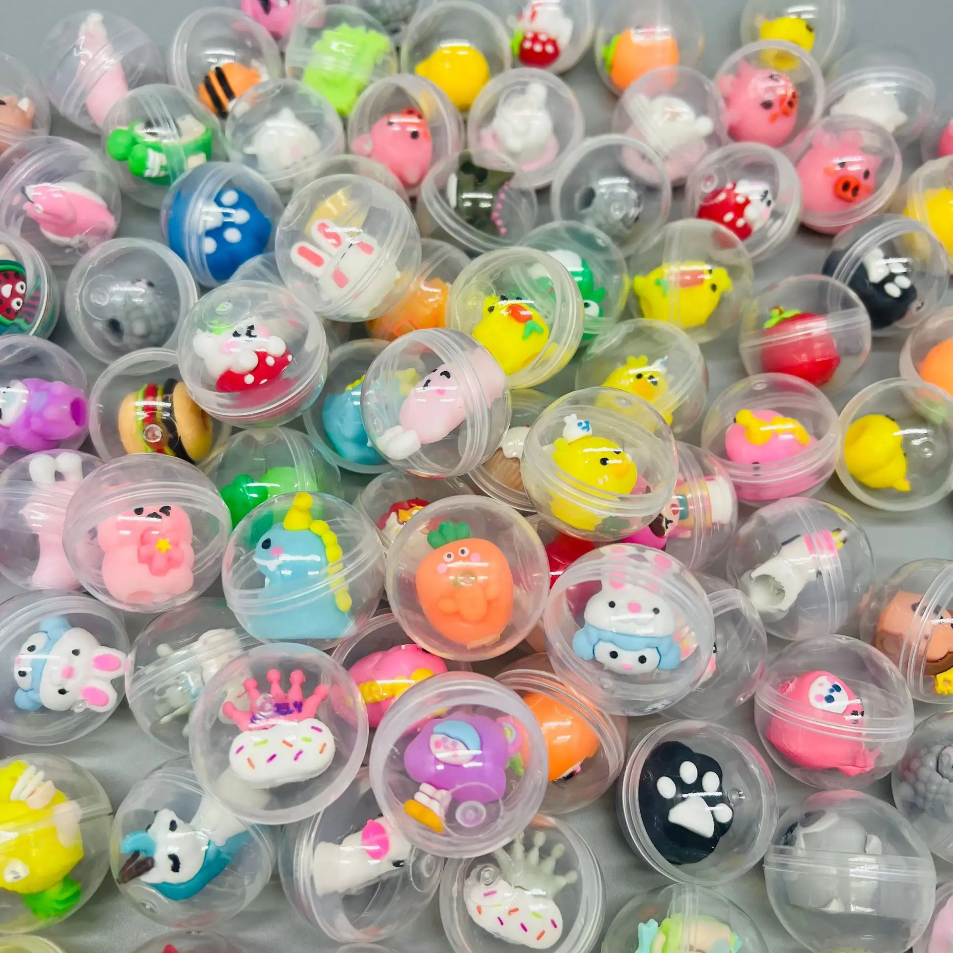 Novelty kids gift mini wholesale 32mm transparent a dollar coin-operated game hall twister egg machine ground stall bouncy ball