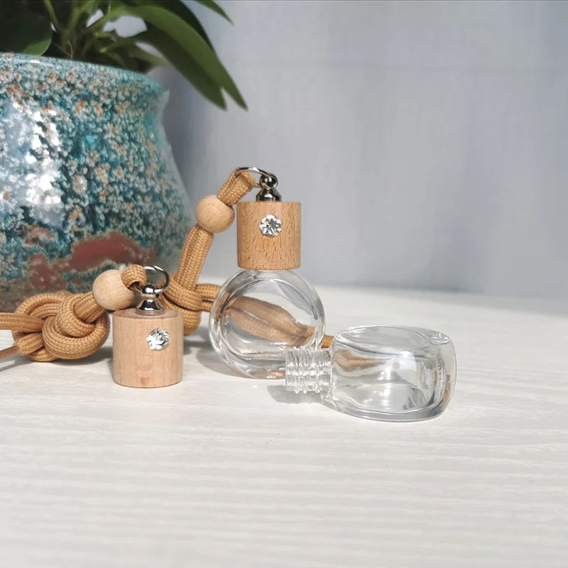 Avertan wholesale 8ml Round shape  High Car Diffuser Perfume Glass Bottle With Hanging Ropes