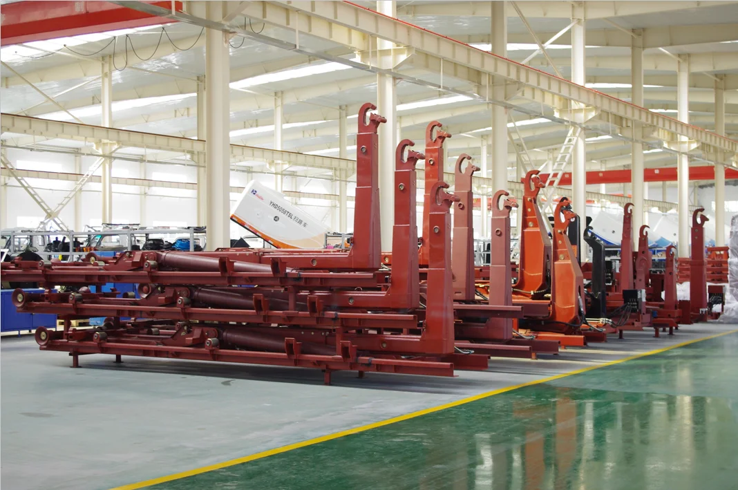 Hydraulic hook lift hoist mounted on heavy duty trucks designed for  transportation of materials in the waste, recycling, scrap