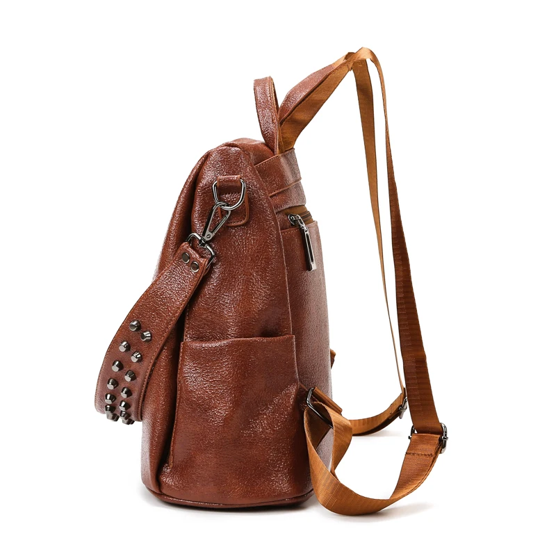 high quality soft PU leather wholesale young teenager casual backpack large capacity solid color backpack with rivet decoration