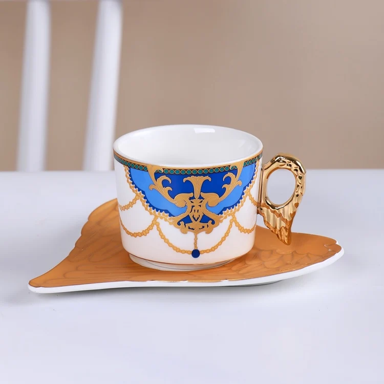 Luxury Gold Classic Tea Cup Coffee Cup with Heart-shaped Saucer Porcelain Cups Angel Wing Handle