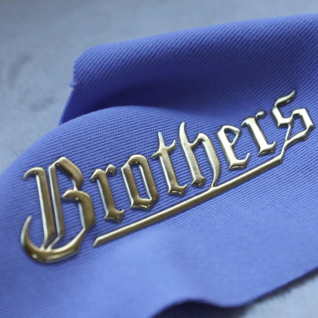 Custom High Quality Golden TPU Heat Transfer Sticker Soft 3D Embossed Patches Badges for Garments