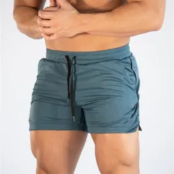 Summer Gyms Workout Male Breathable Mesh Quick Dry Sportswear Jogger Beach Solid Shorts Men Fitness Bodybuilding Shorts