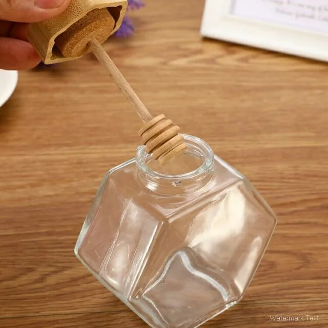 Hot Selling Product Food Grade Unique Empty Clear Hexagonal Glass Honey Jars With Wooden Dipper