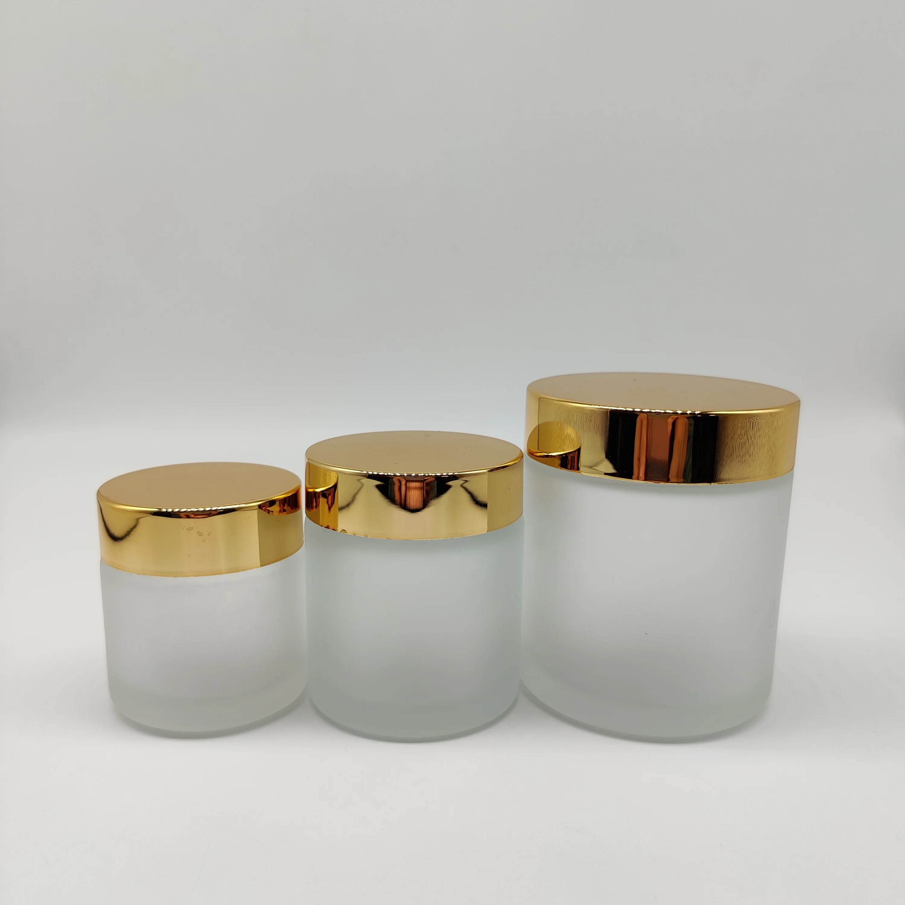 Factory hot sell cosmetic packaging 50ml frosted clear glass jar with bamboo lid