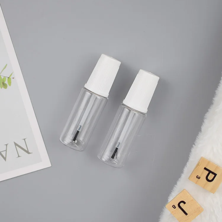 Empty  car repair paint  rpet  bottle with mixing ball and brush