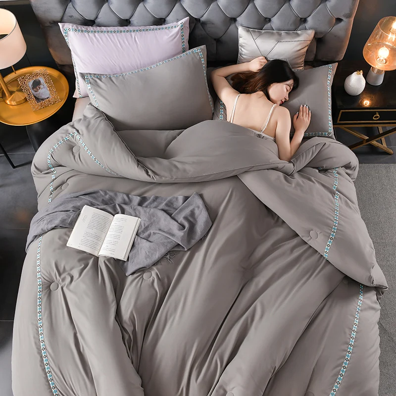 Wholesale Ultra Soft Hotel Brushed Microfibre Custom Solid Color Satin Embossed Polyester Fiber Comfort Bedding Quilt