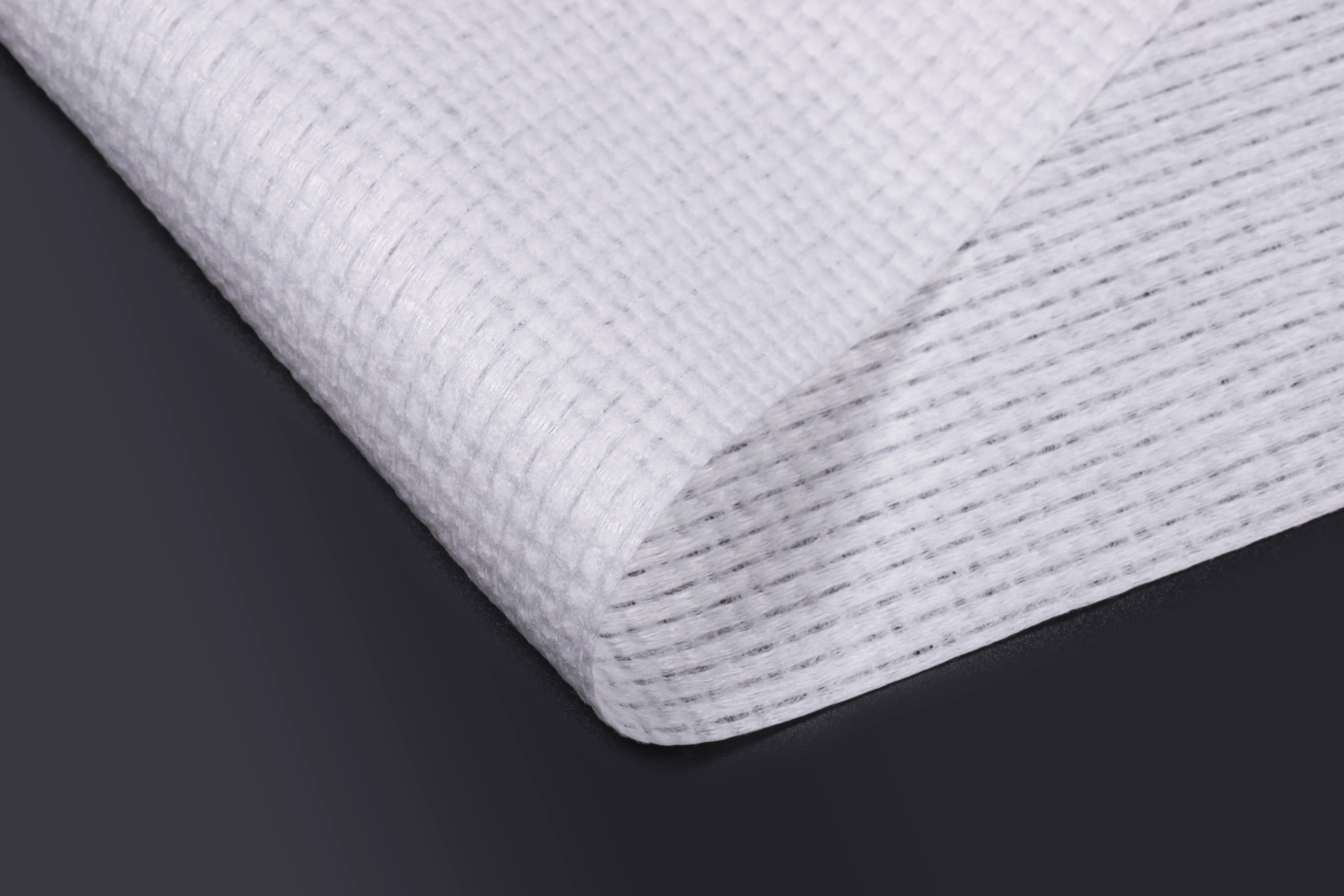 Polyester Non-Woven Fabric Roll Water Spunlace Non-Woven Fabric Wet Tissue Paper Material Soft Thin Surface Skincare