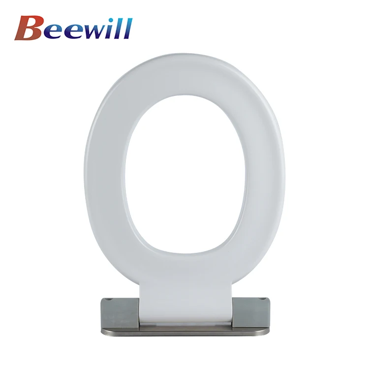White Thermoplastic Flip Up Spring Loaded Toilet Seat