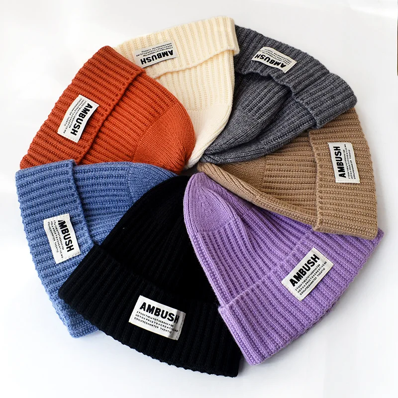 Hot sale wholesale knitted hat with custom logo knitted ear protection warm hat with cloth label for unisex