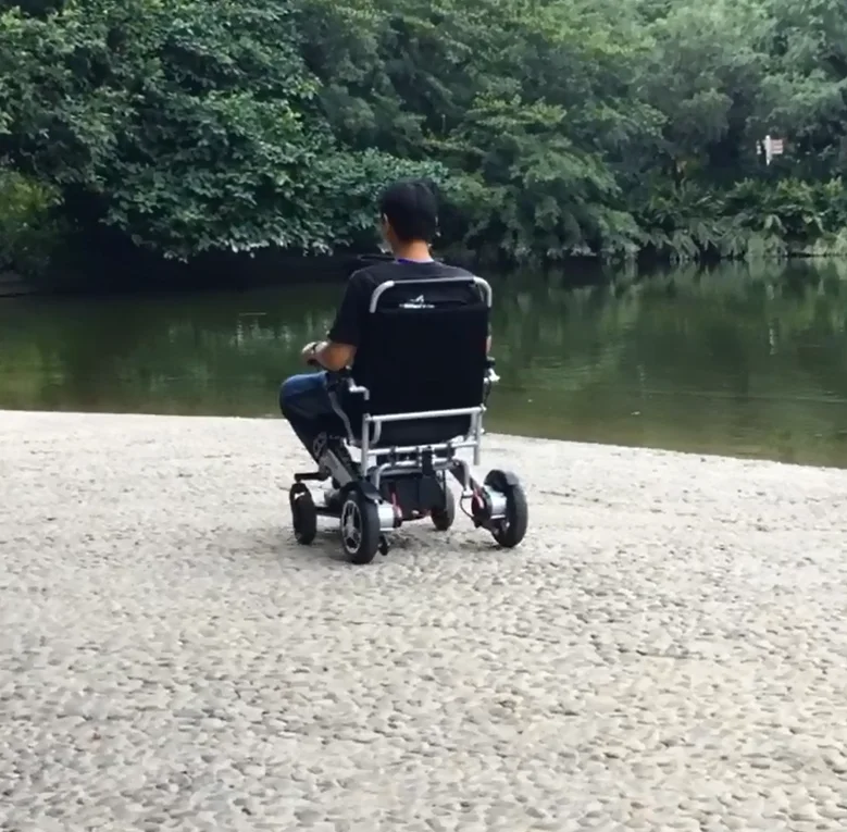 HEDY SEW01 CE MDR High Speed Light Foldable Compact SOS Call FM Remote Control Smart Travel Electric Wheelchair Manufacturer