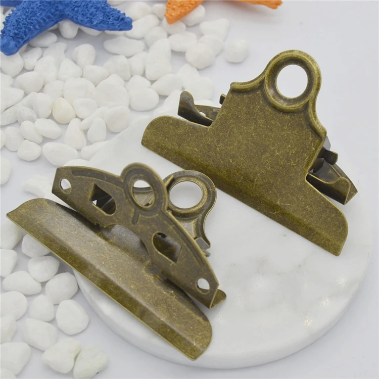 Factory manufacturers wholesale different styles and colors of metal lever clip hot bronze plate clip