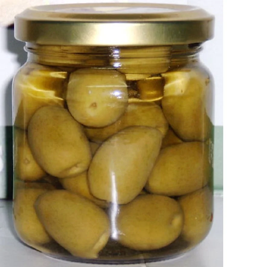 Green natural Spanish Style Manzanilla or Picual olives in brine - whole - pitted - sliced olives