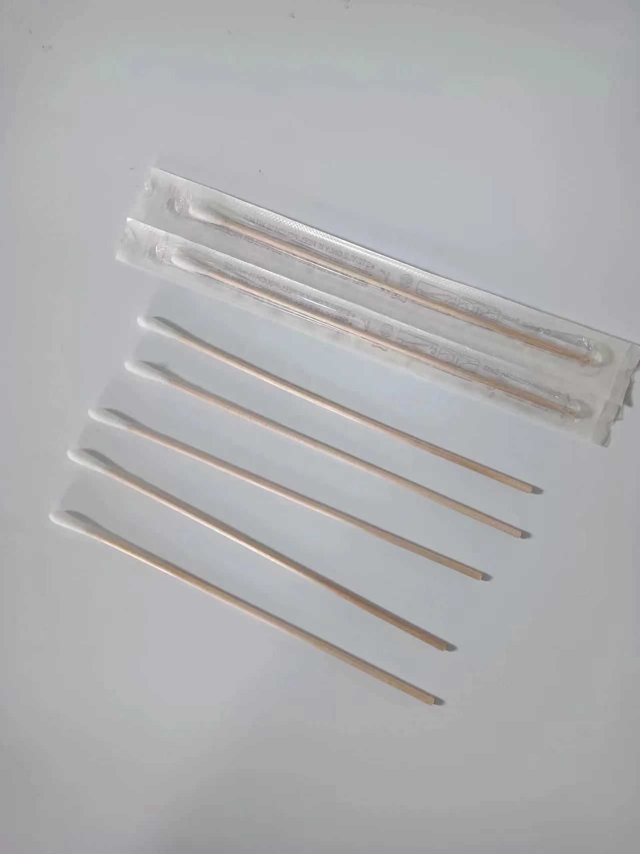 Wooden swab with cotton head