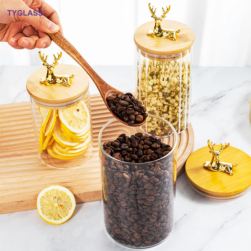 Hot sale High borosilicate large glass pumpkin jars custom stripe glass storage jar with an elk bamboo wooden lids for kitchen