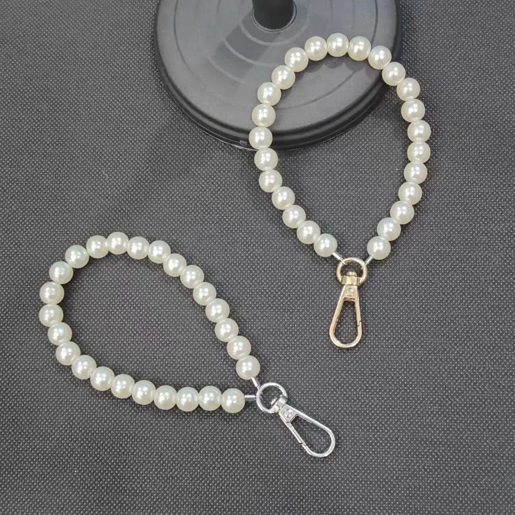 Factory wholesale Pearl Keychain Creative Small Gift Pearl Key Ring With Steel Wire Beading Pendant Key For Bag Accessories