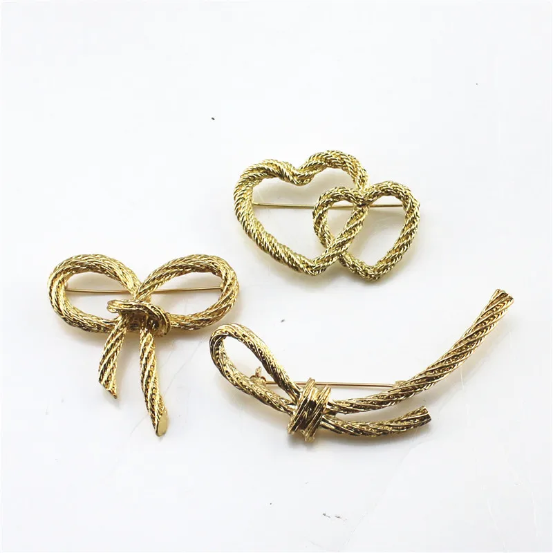 
Fashion simple retro gold knot rope bow brooch twist rope brooch 