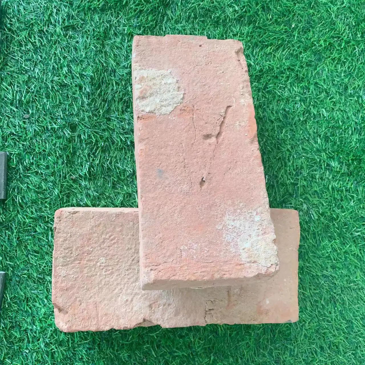 Old red recycled antique clay brick decorative brick building brick