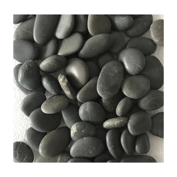 Unpolished black river rock for decorate the garden