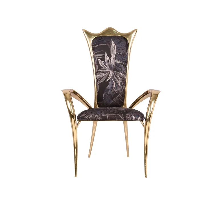 Modern luxurious metal cast copper fabric dining chair.