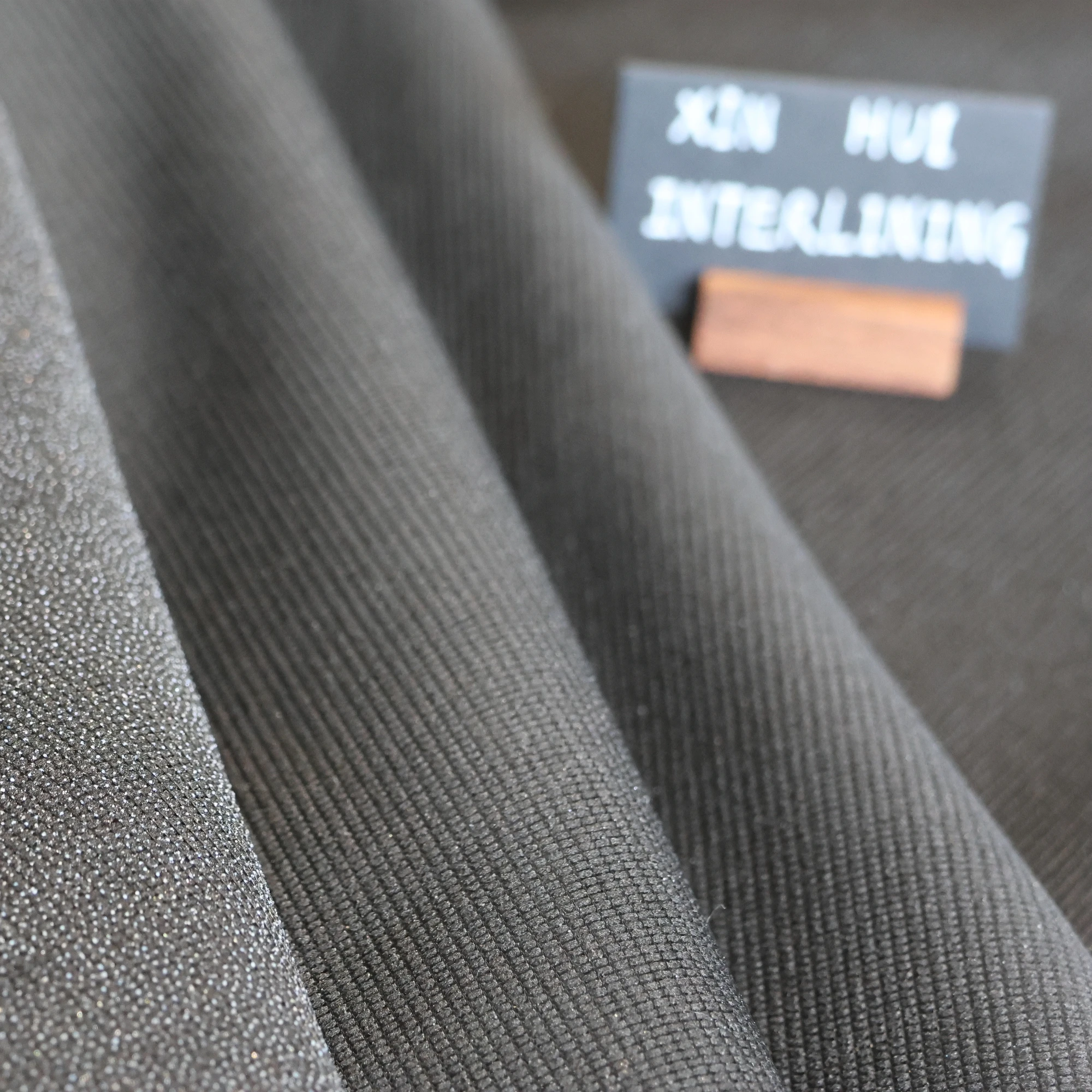 L/C support factory 100% Polyester Stretch Fusible Woven Warp Knitted Interlining