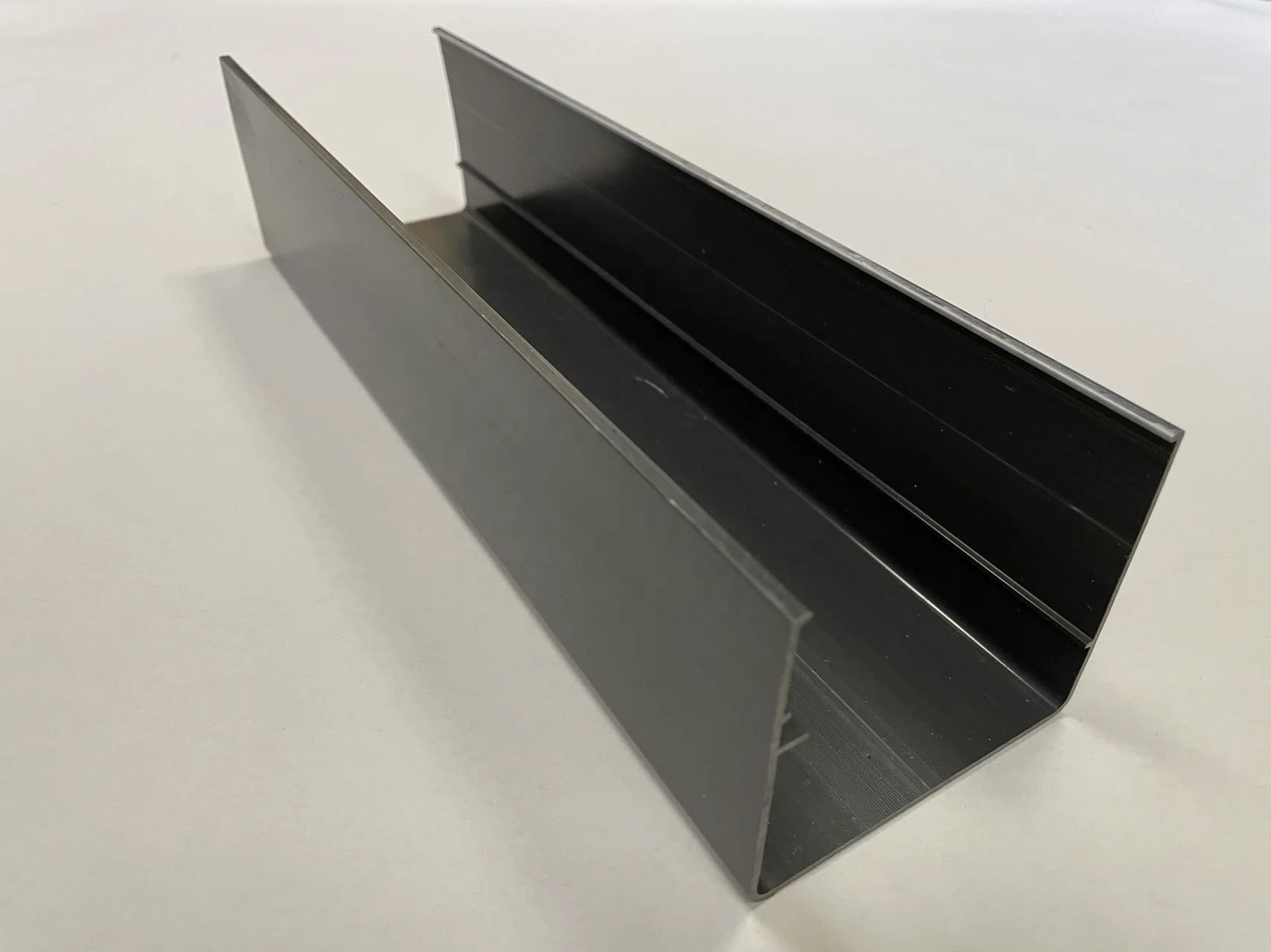 Plastic U shaped extrusion decorated profile for edge trimming