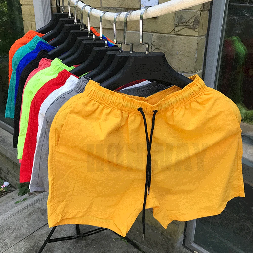 OEM Wholesale Custom Logo Beach Swim Trunks Polyester Men Running Quick Drying Shorts For Mens Summer Sport Wear
