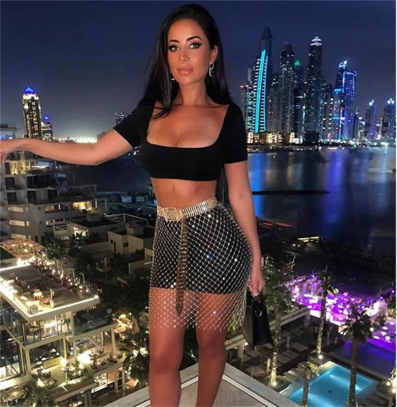 
RS554 Mesh Rhinestone Diamond Fishnet Mini Skirt Fashion Hollow Out Women Skirts Summer Sexy Clubwear Fashion Cover Up Beachwear 