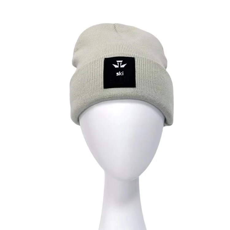 Оптовая продажа акриловая теплая зимняя шапка унисекс с логотипом Спортивная длинная трикотажная в рубчик