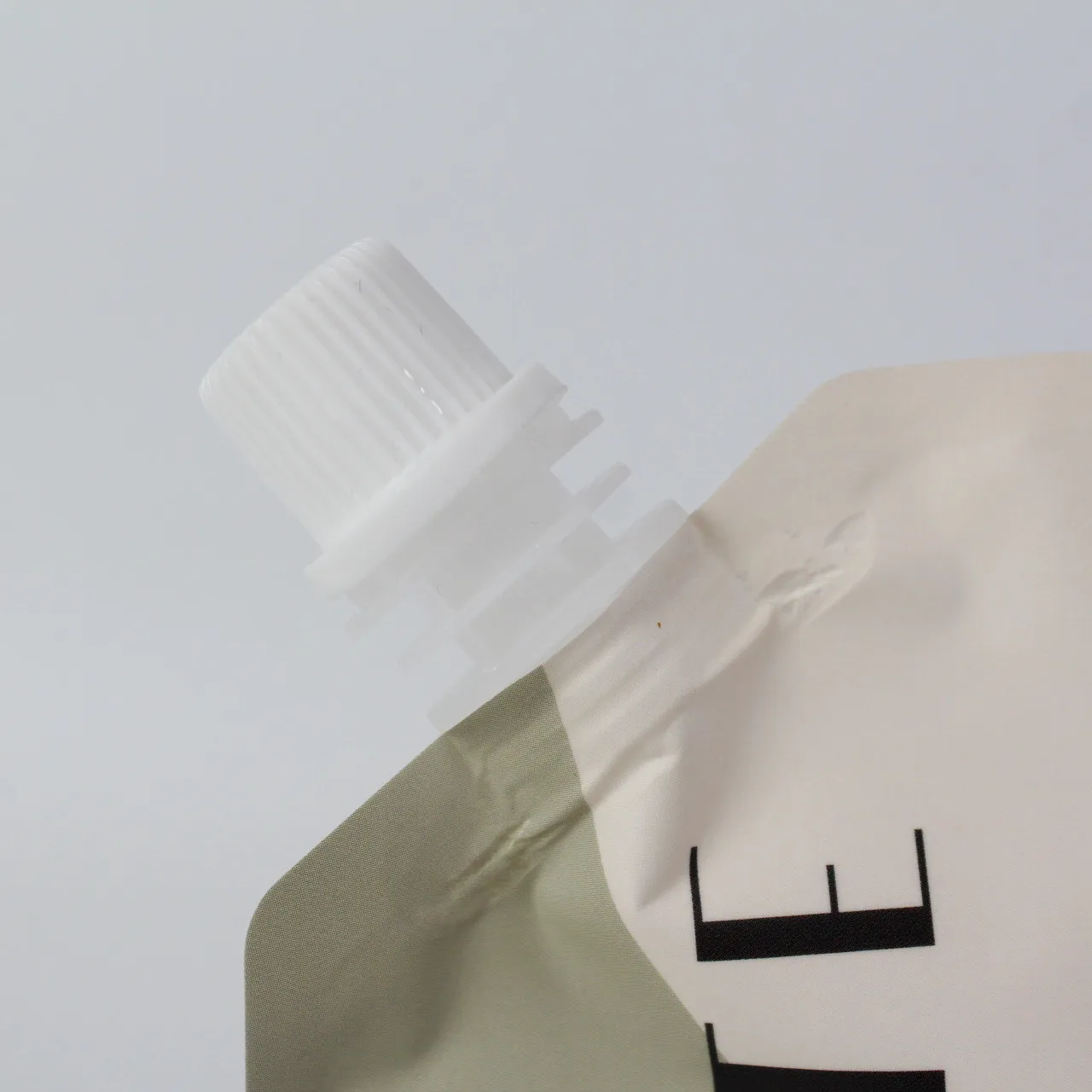 Food grace matte white plastic liquid clear drink juice stand up pouch bag with corner spout