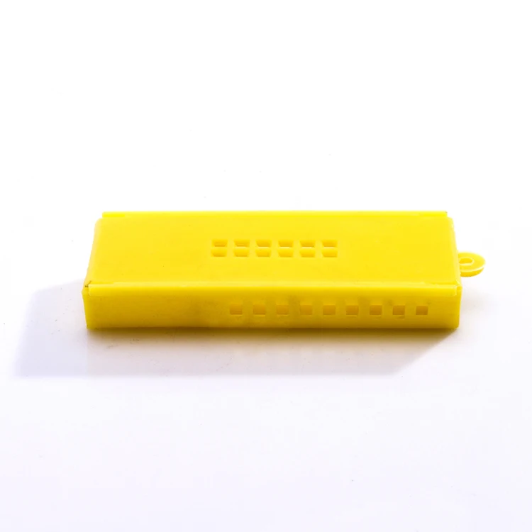 Yellow plastic bee queen cage for beekeeping equipment