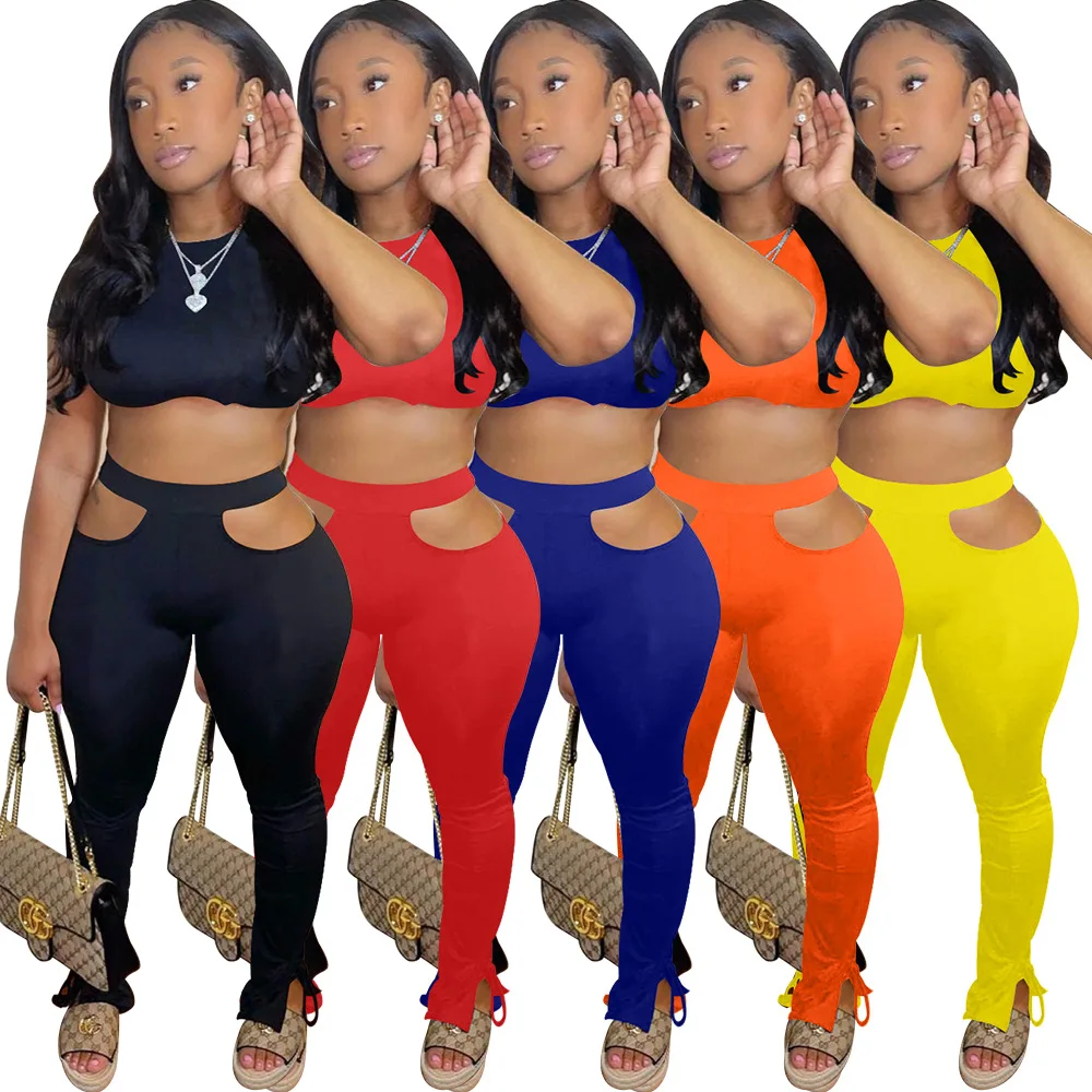 
2021 wholesale clothing women two piece set hollow out solid color suit sexy sports gym fitness sportswear set women clothing 