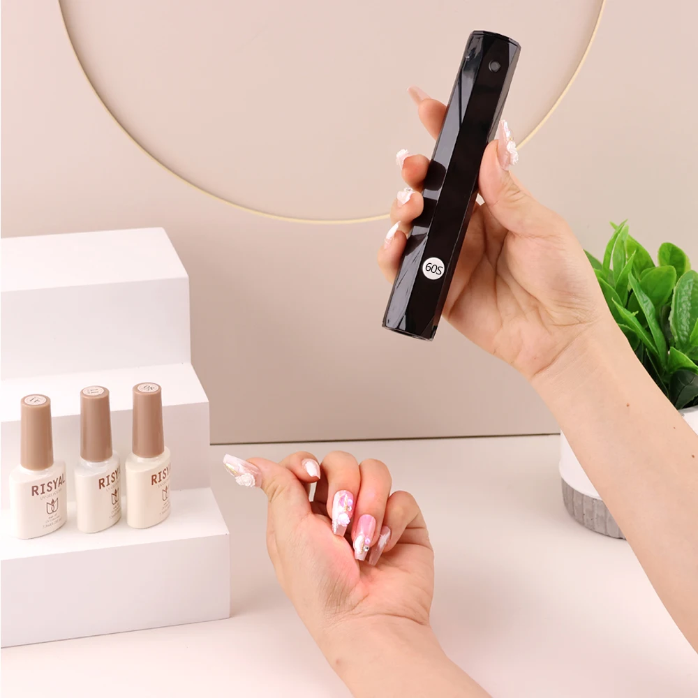 New Portable Handheld and Desktop Wireless Nail Polish Dryer Light 9W Rechargeable Nail Lamp for Flash Curing Extension Nail Tip