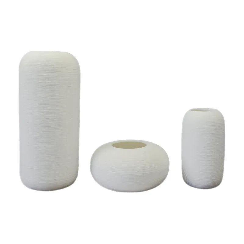 
Wholesale Nordic style porcelain minimalist matte white vase set 3 Handmade ceramic white small vases for home decor wedding 