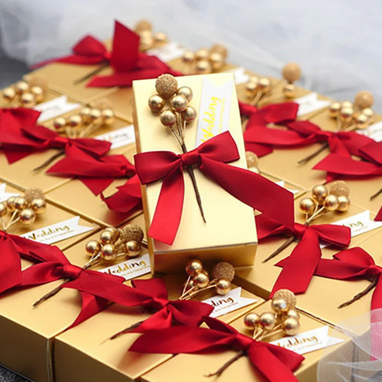 Hot sale luxurty gold wedding candy box bowknot flower paper wedding favors candy gift box