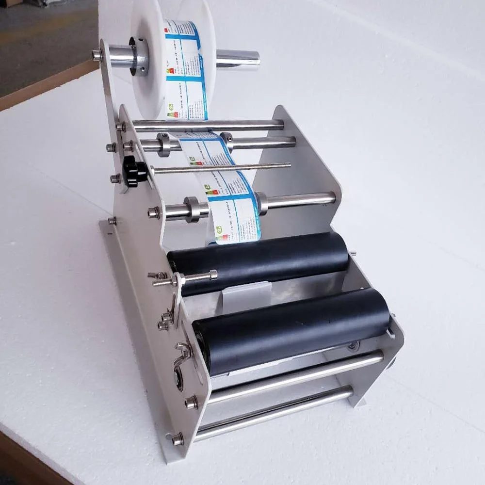 
YTK-L100 manual labeling machine round bottle labeling machine 