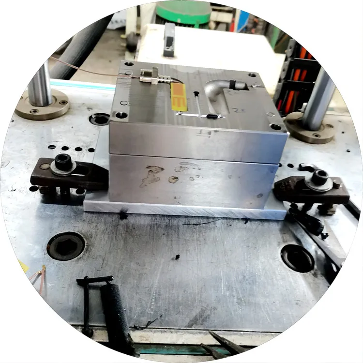 Low voltage injection molding of antenna circuit board PA adhesive