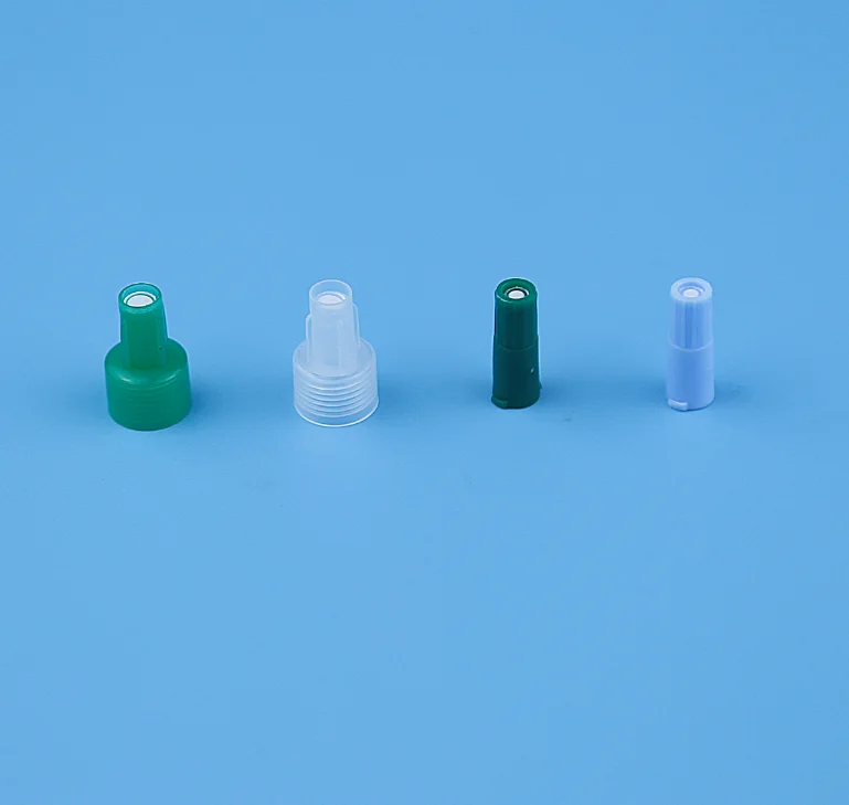 Disposable infusion set priming cap with filter