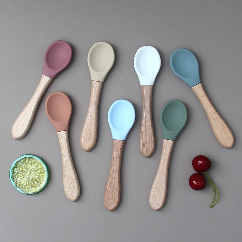 100% Safe BPA Free Wholesale First Stage Toddler Weaning Feeding Soft Spoons Infant Silicone Tips Baby Spoons With Wooden Handle
