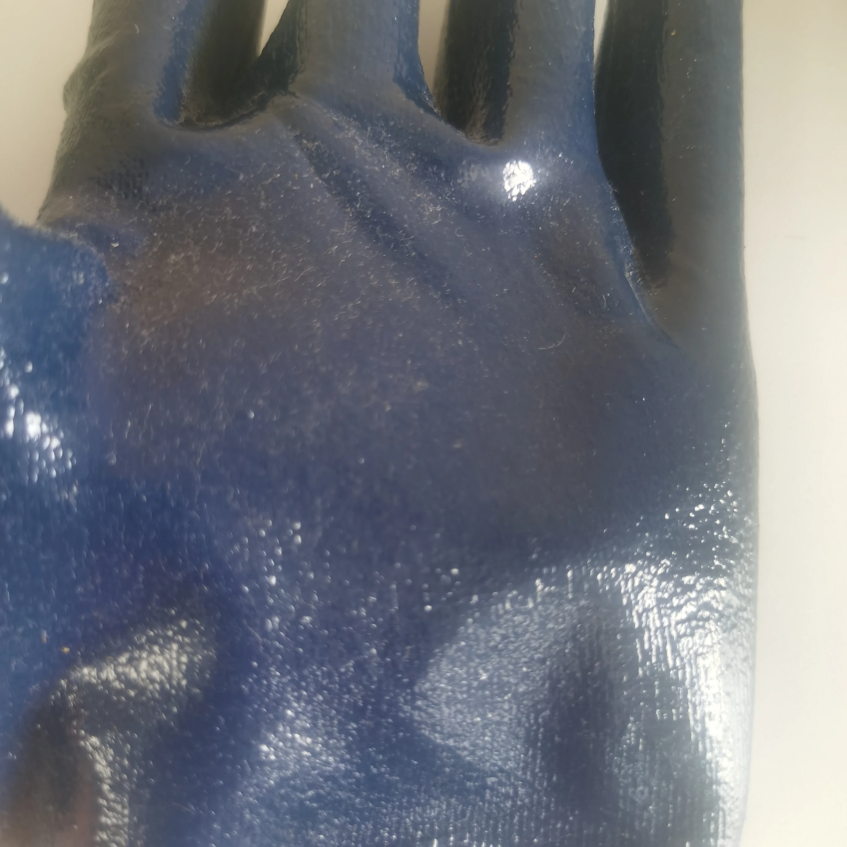 
bule nitrile coated with jersey liner smooth finish with knit wrist gloves 