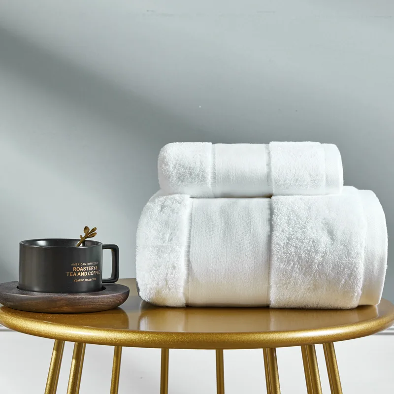 Custom wholesale five-star hotel linen cotton combed cotton spiral satin solid color towel