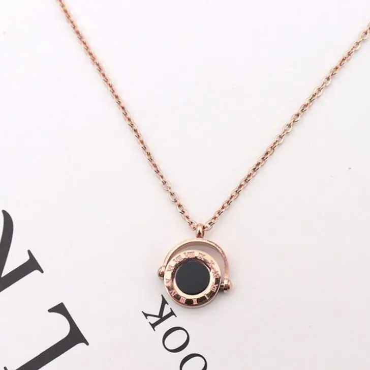 
Titanium steel big circle black and white rotating pendant Korean fashion roman long women sweater thick necklace 