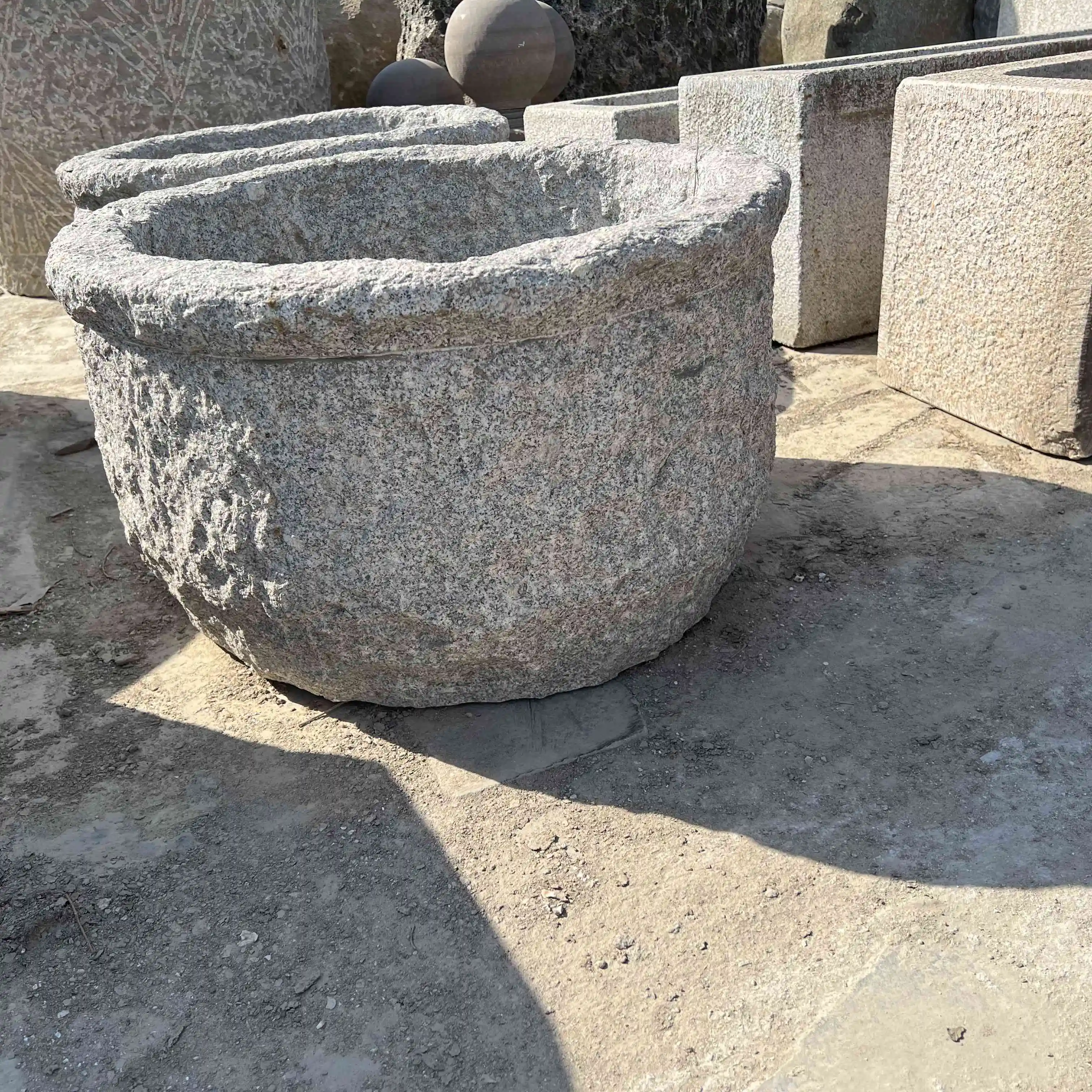 Old circular stone trough grey granite outdoor big flower square port basin