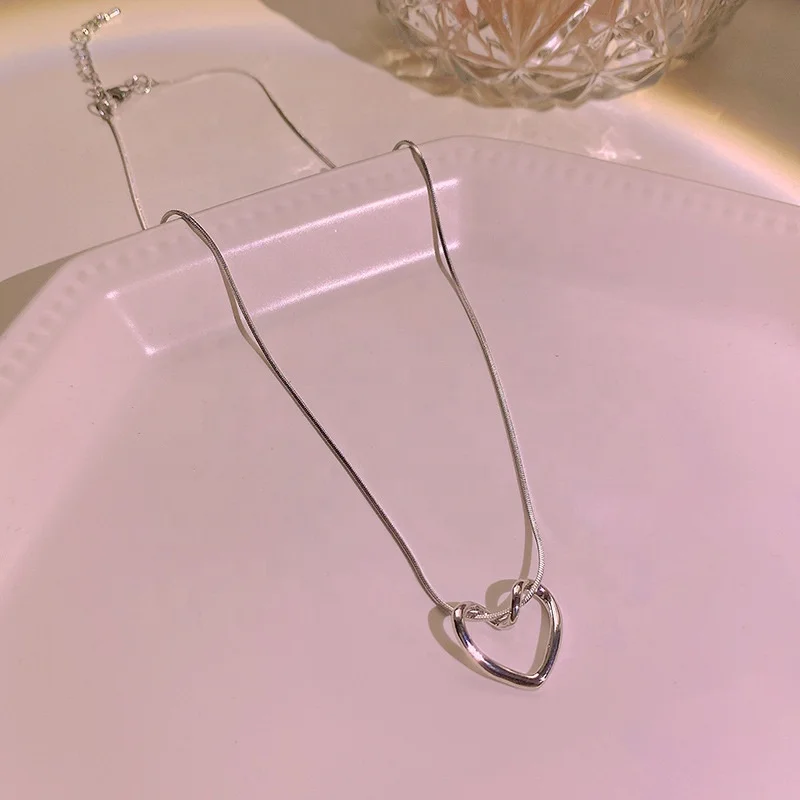 2022 Chic Design Silver Hollow Heart Pendant Necklace Snake Chain Titanium Steel Light Luxury Niche Design Heart Necklace For Gi