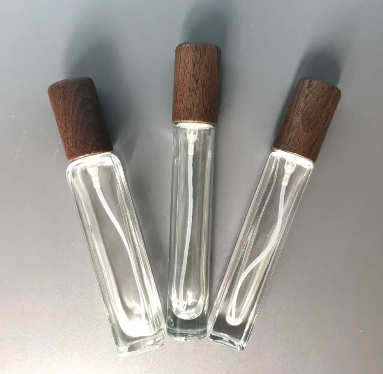 High Quality 10ml portable perfume cosmetics glass bottle with fine mist spray bamboo caps