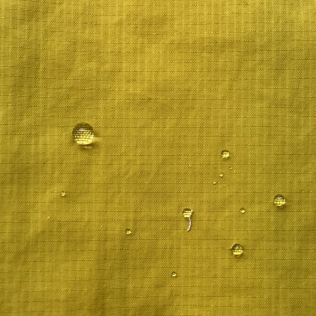 wholesale wrinkle 100% nylon 40D waxing checking ripstop fabric waterproof PU glue coating down jacket windproof fabric for coat